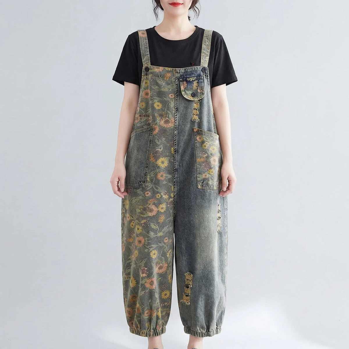 Denim-Latzhose mit Blumenmuster und verstellbaren Trägern breites Bein