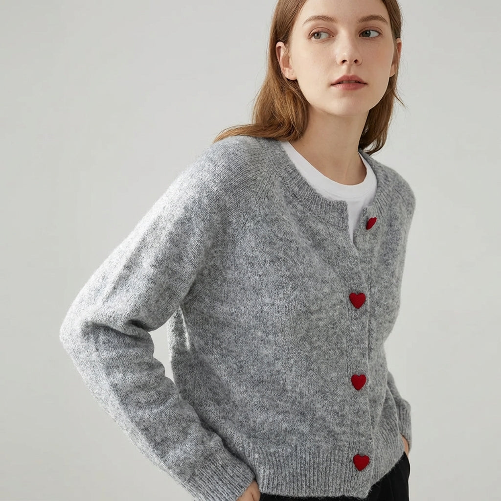 Gestrickte Strickjacke mit Herzknöpfen abgesetzter Schulter lockere Passform