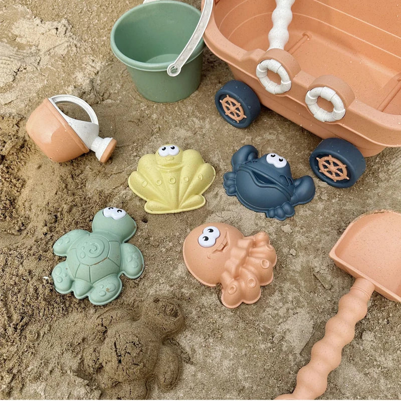 Sandspielzeug-Set für Kinder mit Bagger, Kran und Meerestier-Förmchen