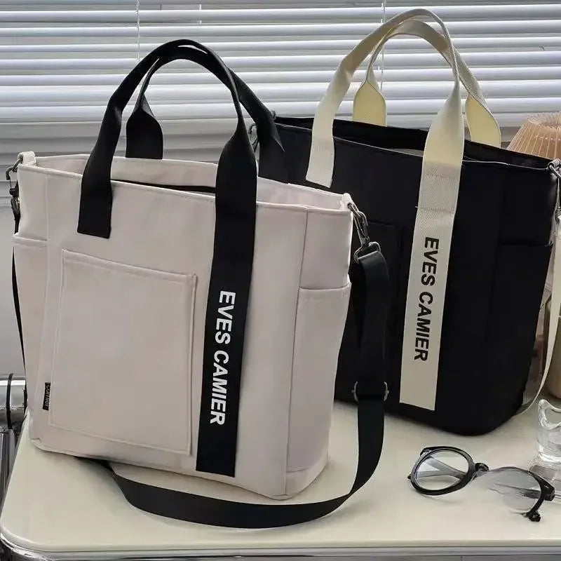 Große Shopper-Tasche mit wasserabweisendem Material und Seitenfach für Flaschen