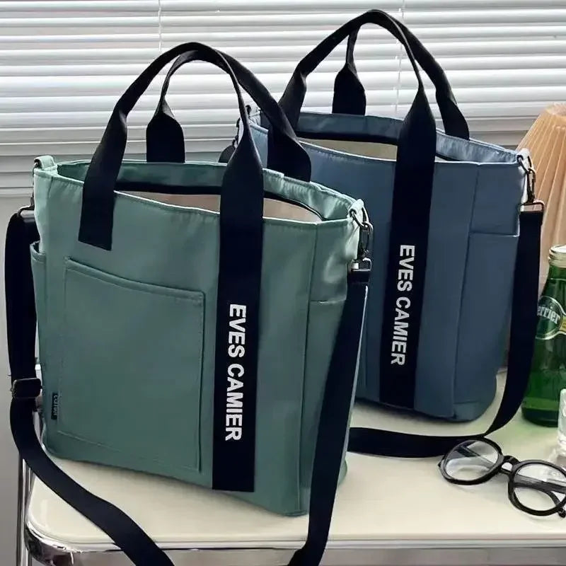 Große Shopper-Tasche mit wasserabweisendem Material und Seitenfach für Flaschen