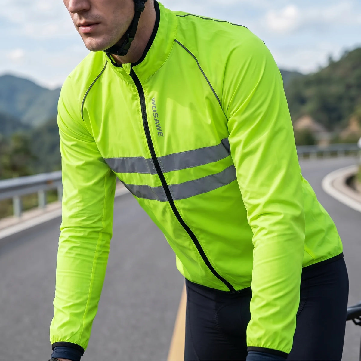 Leichte Fahrrad-Windbreaker mit reflektierenden Bruststreifen und verlängertem Rückenzipfel