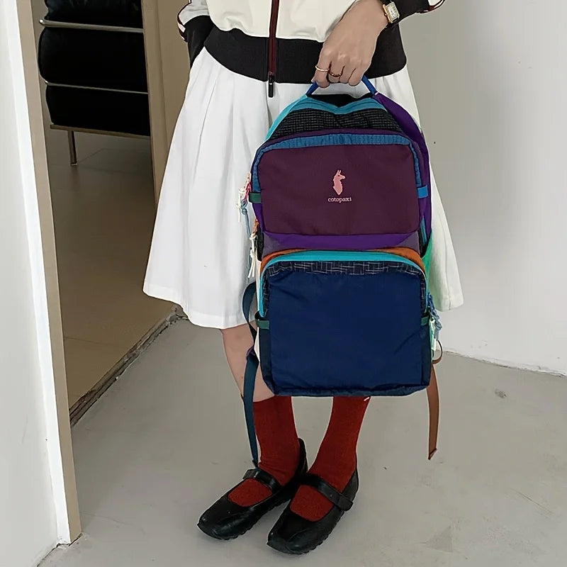 Leichter Farbblock-Rucksack mit gepolsterten Trägern und mehreren Taschen