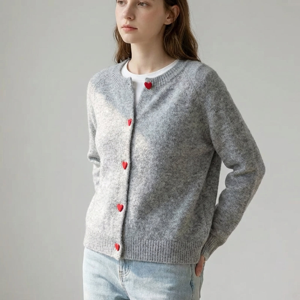 Gestrickte Strickjacke mit Herzknöpfen abgesetzter Schulter lockere Passform
