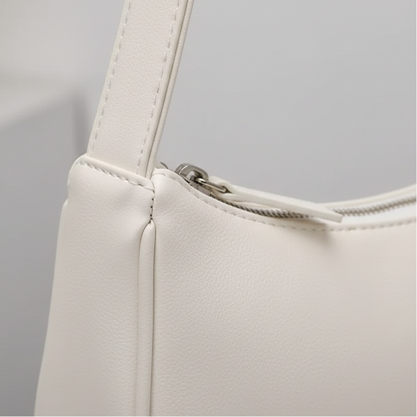 Kleine Schultertasche Kunstleder Baguette-Form strukturiert