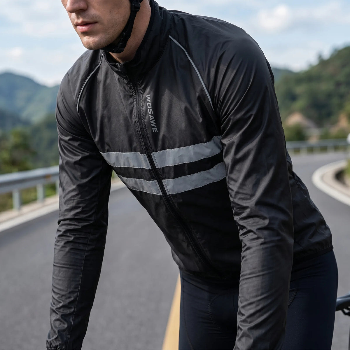 Leichte Fahrrad-Windbreaker mit reflektierenden Bruststreifen und verlängertem Rückenzipfel