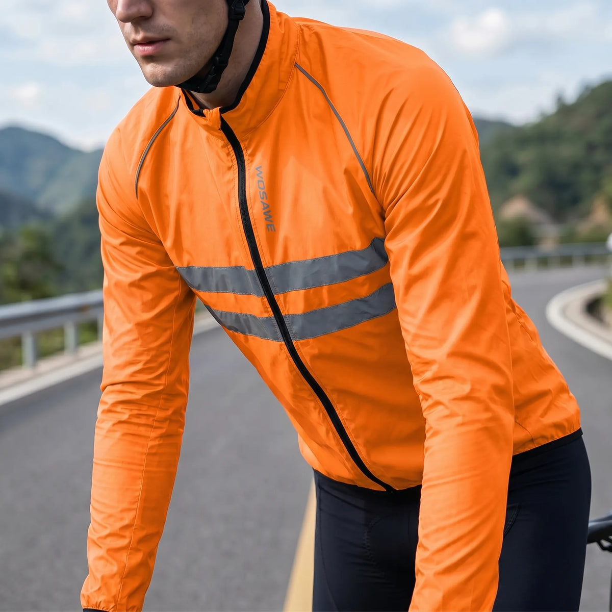 Leichte Fahrrad-Windbreaker mit reflektierenden Bruststreifen und verlängertem Rückenzipfel