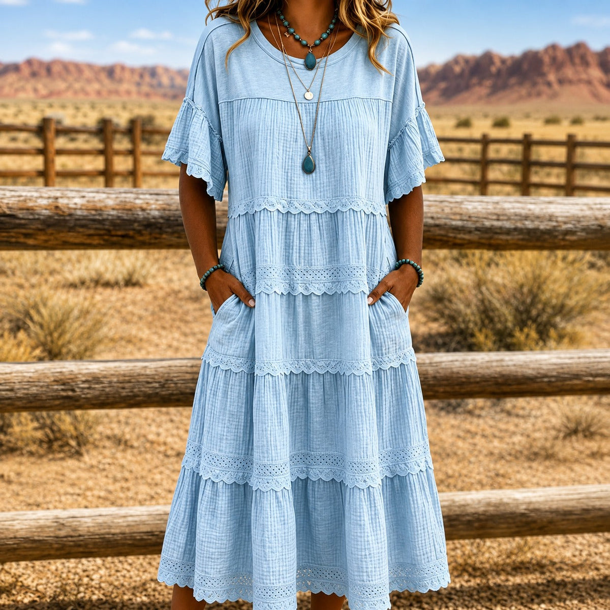 Kleid mit geschichteter Modellierung, Spitze und Seitentaschen