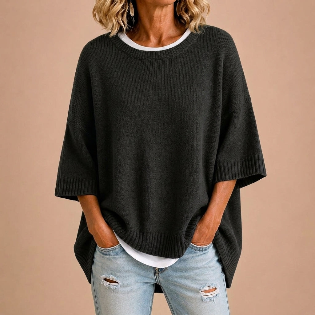 Poncho aus Strickstoff mit weitem Schnitt und klarer Linie